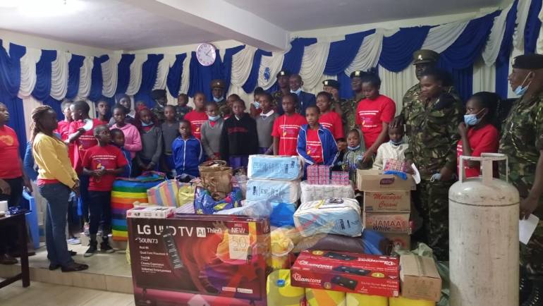 CORPS OF TRANSPORT VISIT CHILDREN’S HOME