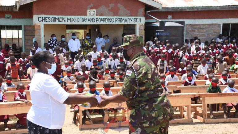 RECRUITS TRAINING SCHOOL DONATES 300 DESKS, 1200 EXERCISES BOOKS TO SCHOOLS IN BARINGO COUNTY