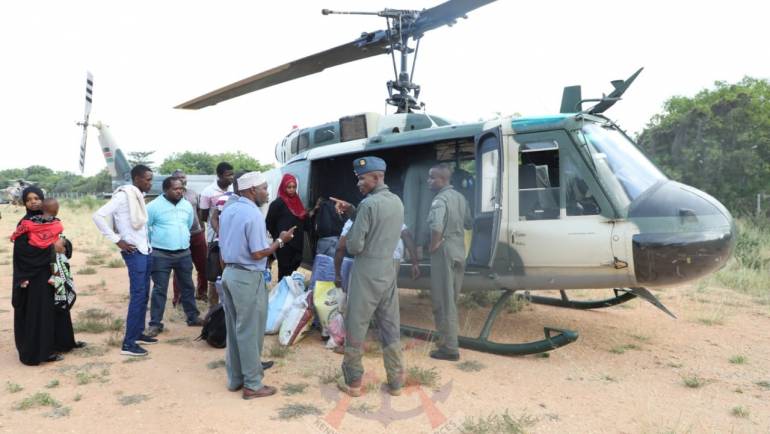 MILITARY AIRLIFTS TEACHERS WORKING NEAR BONI FOREST TO SCHOOLS AS LEARNING RESUMES