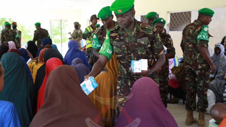 ATMIS KDF TROOPS DONATE ASSORTED FOODSTUFFS TO DHOBLEY LOCALS
